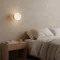 Savana Mini Orb Alabaster Wall Light, front view